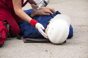 First Aid Response of worker on the ground